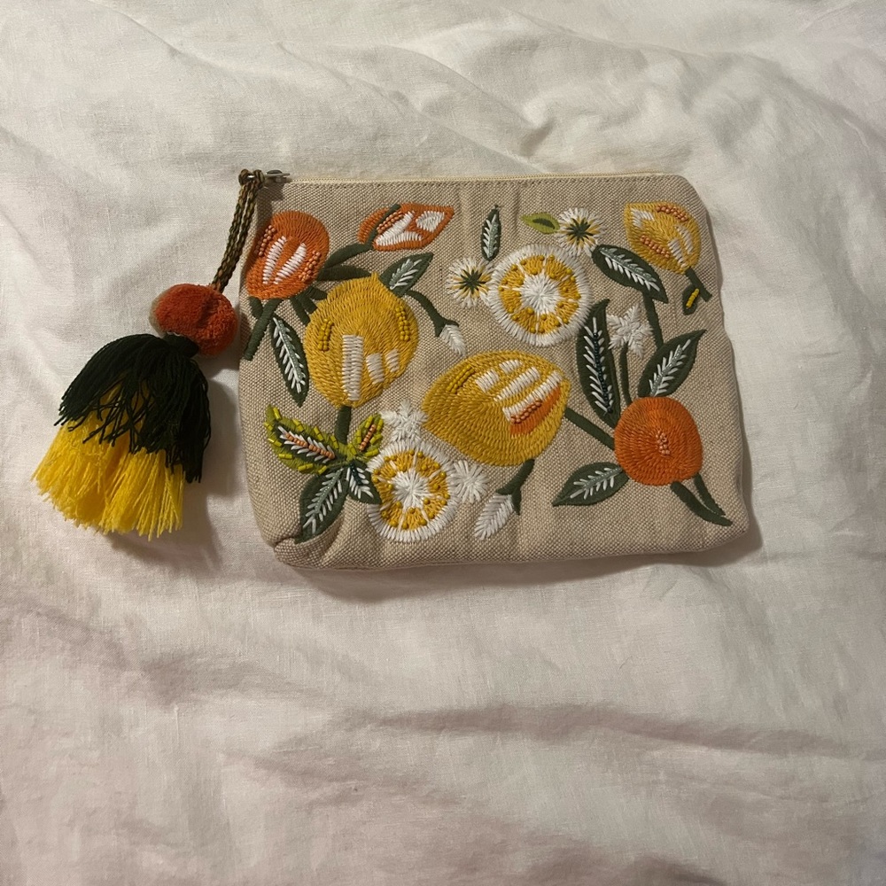 Work once! Adorable embroidered clutch with tassel!